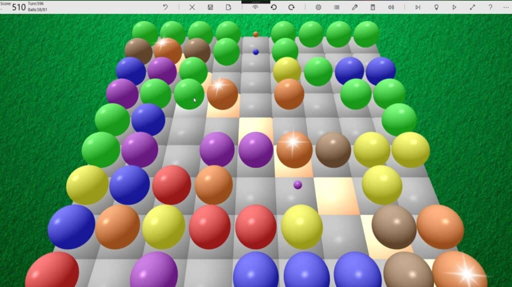 Skærmbillede fra Lines 3D puslespil med farvede kugler på et tredimensionelt spillebræt, hvor spilleren samler ens farver i rækker for at opnå point