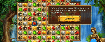 Skærmbillede fra Cradle of Rome, hvor vi får en tutorial-besked midt på et farverigt Match 3-bræt med symboler som mønter, bladfliser og mariehøner, omgivet af et frodigt jungle-tema.