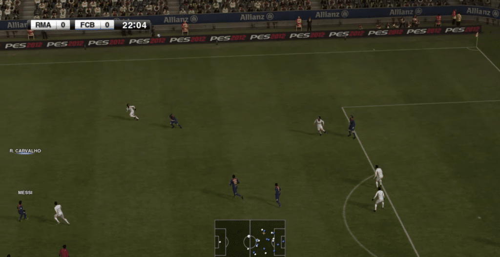 Gameplay from Pro Evolution Soccer 2012, where Real Madrid and FC Barcelona meet in an intense match with realistic ball control and tactical play.