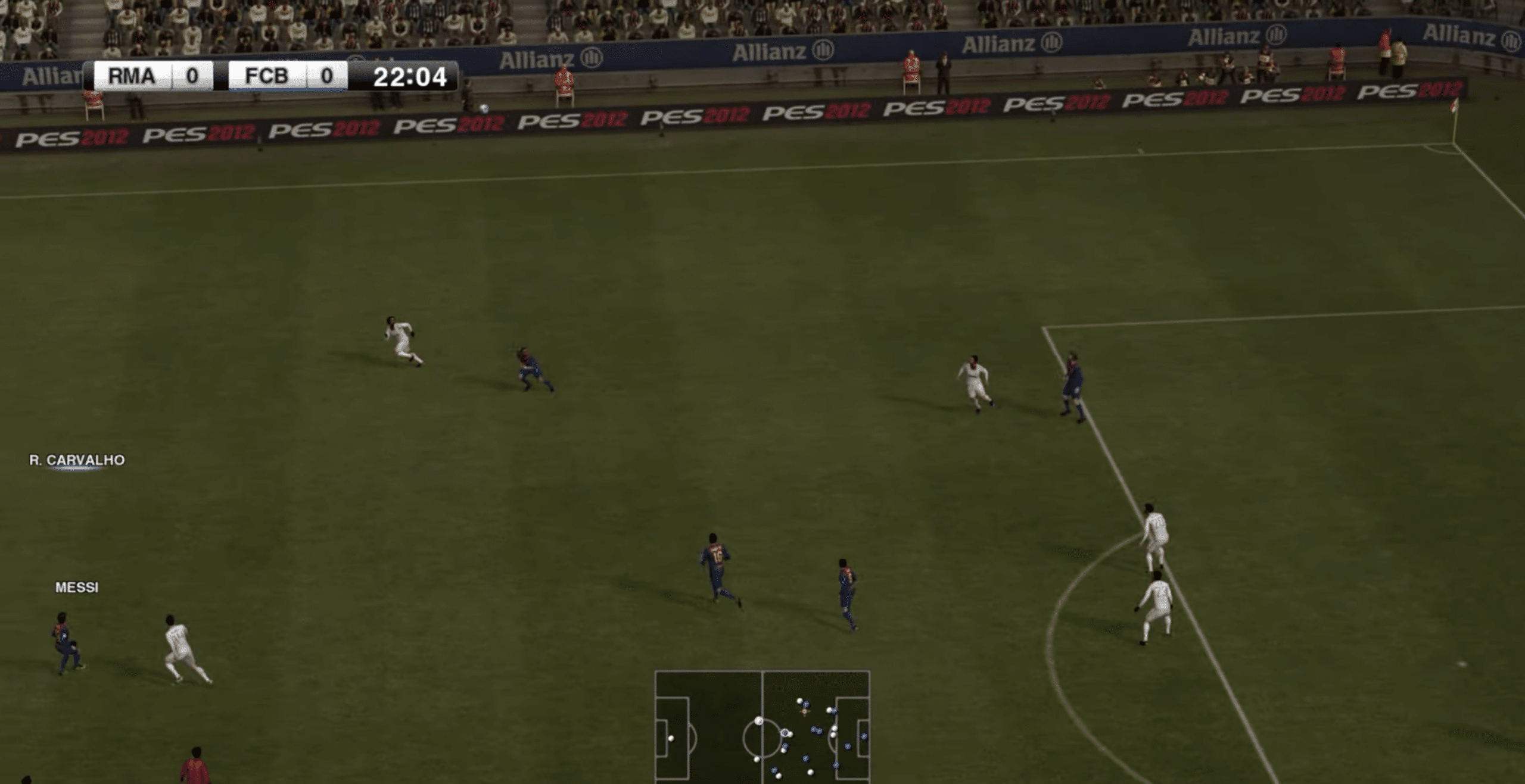 Gameplay from Pro Evolution Soccer 2012, where Real Madrid and FC Barcelona meet in an intense match focusing on realistic ball control and tactical play.