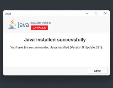 Oracle Java installationsvindue på en Windows 11-computer, hvor beskeden 'Java installed successfully' vises efter en vellykket installation under vores test.