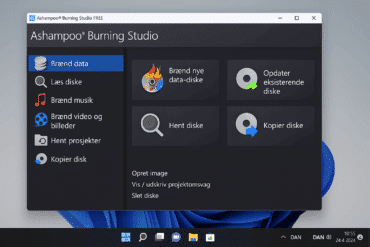 Ashampoo Burning Studio Free åbent på en Windows 11-PC, hvor hovedmenuen viser valgmuligheder som Brænd data, Læs diske, Brænd musik og Kopier disk. Programvinduet har et mørkt tema med farverige ikoner og en tydelig dansk brugerflade.