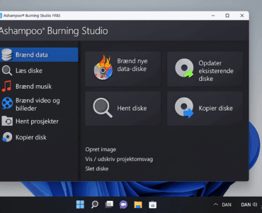 Ashampoo Burning Studio Free åbent på en Windows 11-PC, hvor hovedmenuen viser valgmuligheder som Brænd data, Læs diske, Brænd musik og Kopier disk. Programvinduet har et mørkt tema med farverige ikoner og en tydelig dansk brugerflade.