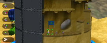 Screenshot fra Lemmings Revolution med en rund/cylindrisk bane, hvor flere lemminger bevæger sig rundt på platforme og du vælger handlinger i venstremenuen.