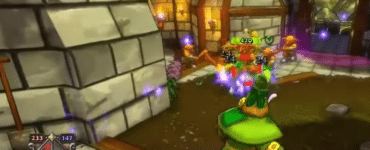 Gameplay fra Dungeon Defenders, hvor spilleren bekæmper fjender i en borg med magi og tårnbaseret forsvar