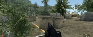 Crysis demo gameplay med våben i første person ved en militærlejr på tropisk ø