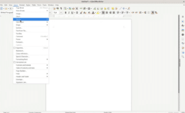 LibreOffice Writer på en Windows 11-pc med “Insert”-menuen åben og valgmuligheden “Media” markeret, klar til at indsætte indhold i et tomt dokument.