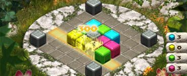 Gameplay fra BeachBlox, hvor farvede blokke matches på et roterbart bræt for at opnå point og fuldføre missioner.