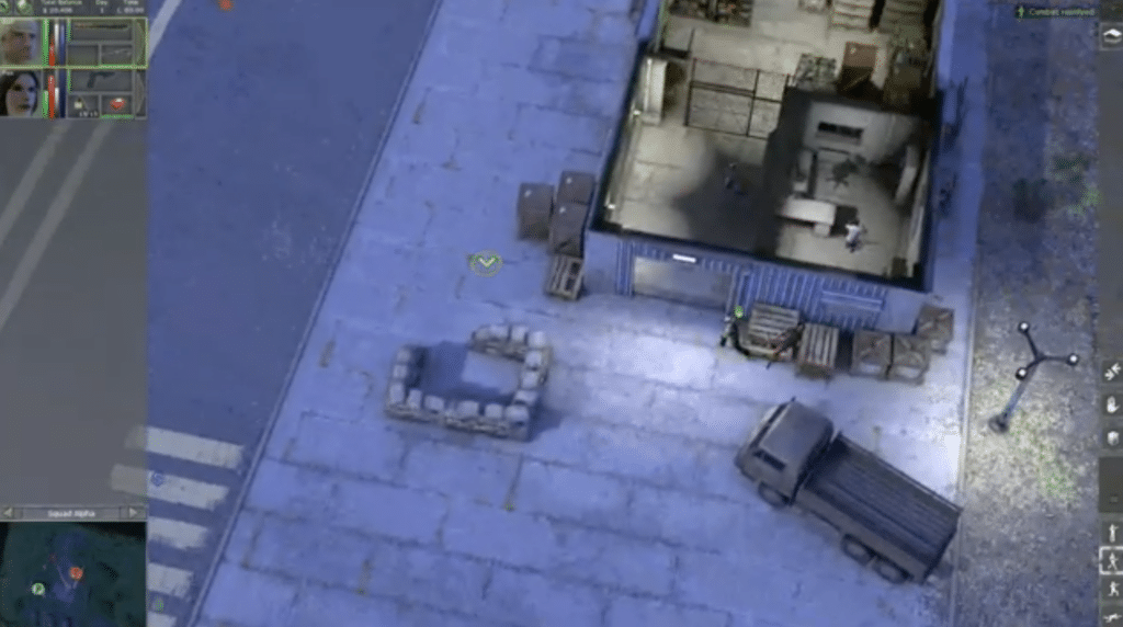 Screenshot fra Jagged Alliance: Back In Action, hvor spilleren styrer lejesoldater i et isometrisk byområde med bygning, lastbil og taktisk interface.
