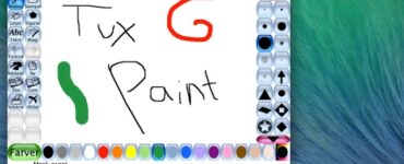 Skærmbillede af Tux Paint på macOS med dansk brugerflade, farvepalette nederst og en tegning hvor der står “Tux Paint”.