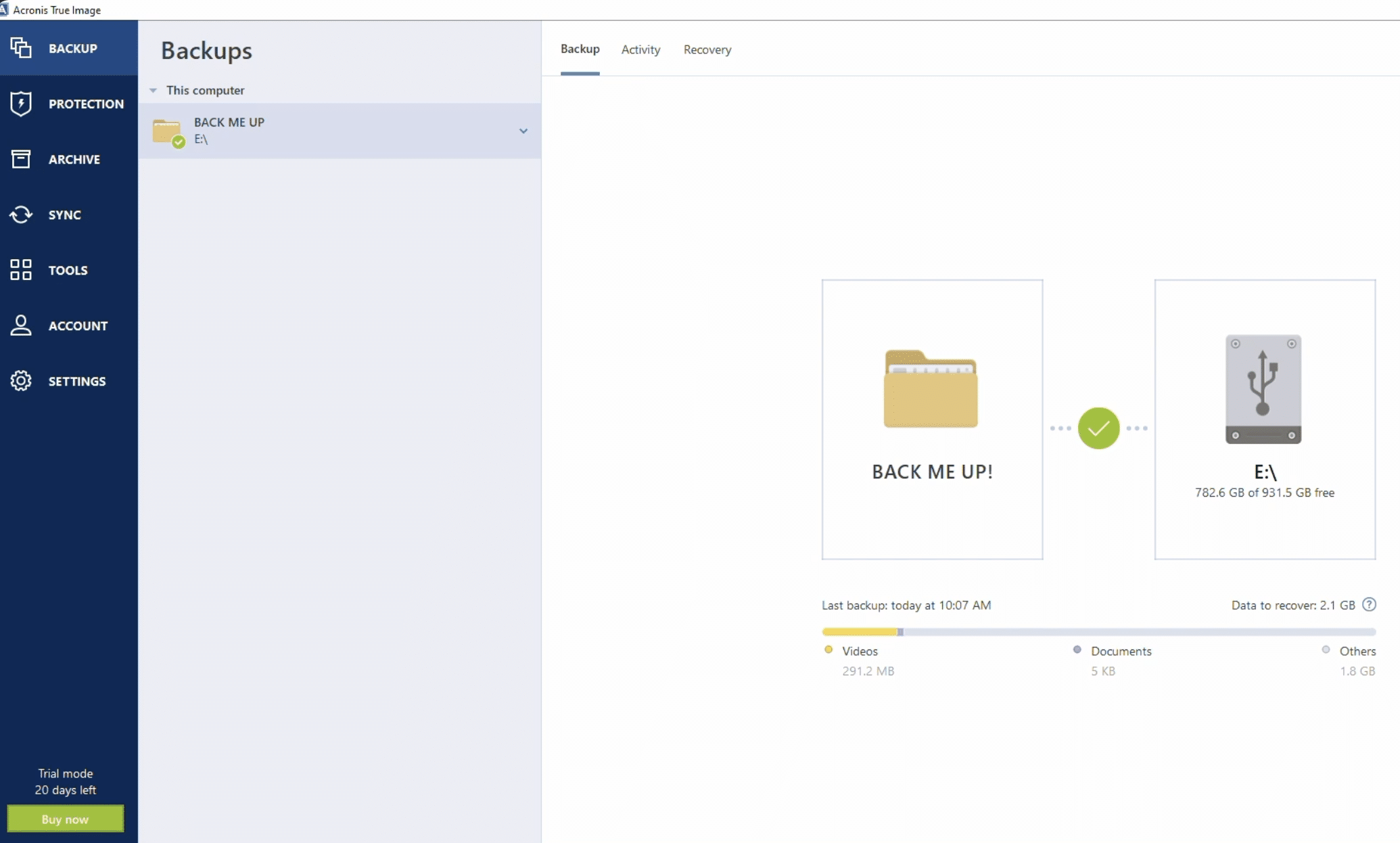Acronis True Image on Windows 11 showing the backup overview, with Back Me Up! running to external drive (E:) in our test