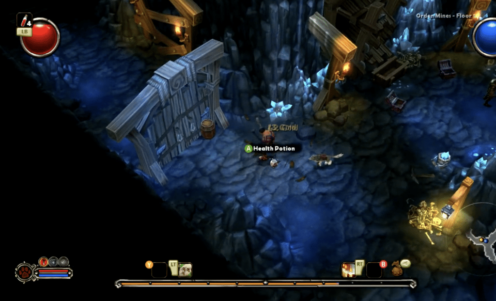 Torchlight gameplay i Orden Mines med loot, health potion, krystaller og dungeon-miljø under vores test.