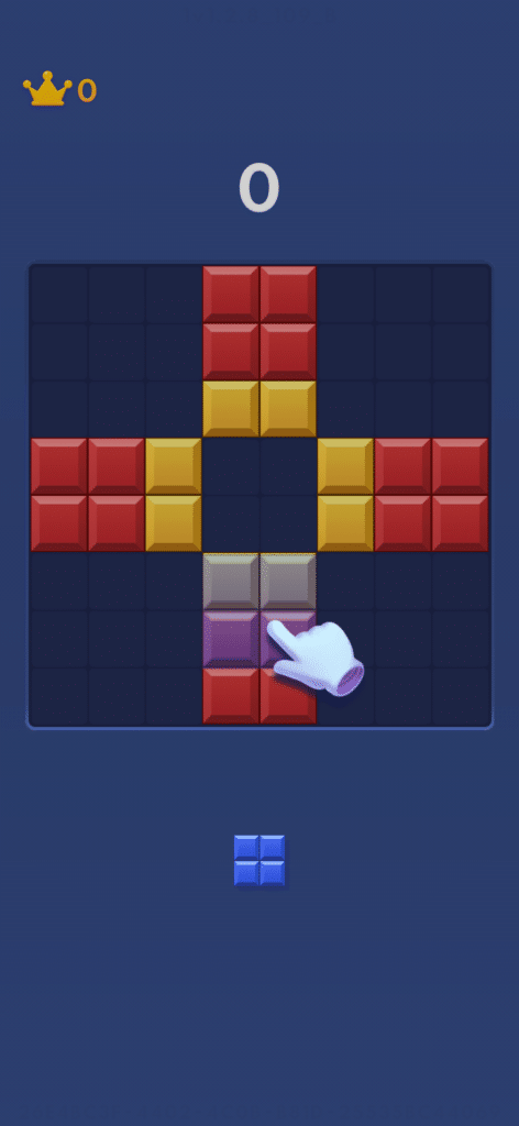 Startskærm fra Block Blast, hvor spilleren placerer farvede blokke på spillepladen, mens en hånd-ikon viser, hvor næste brik kan lægges.