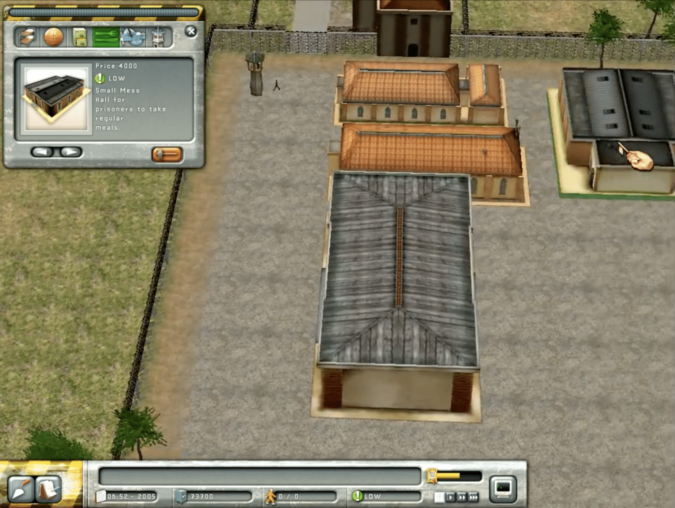 Skjermbilde fra Prison Tycoon, der spilleren bygger og administrerer fengselsbygninger, murer og fasiliteter i et klassisk isometrisk tycoon-spill