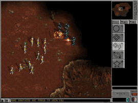 Kamp i Dark Colony, hvor menneskelige soldater angriber en gruppe aliens på Mars’ røde overflade i spillets klassiske RTS-visning.
