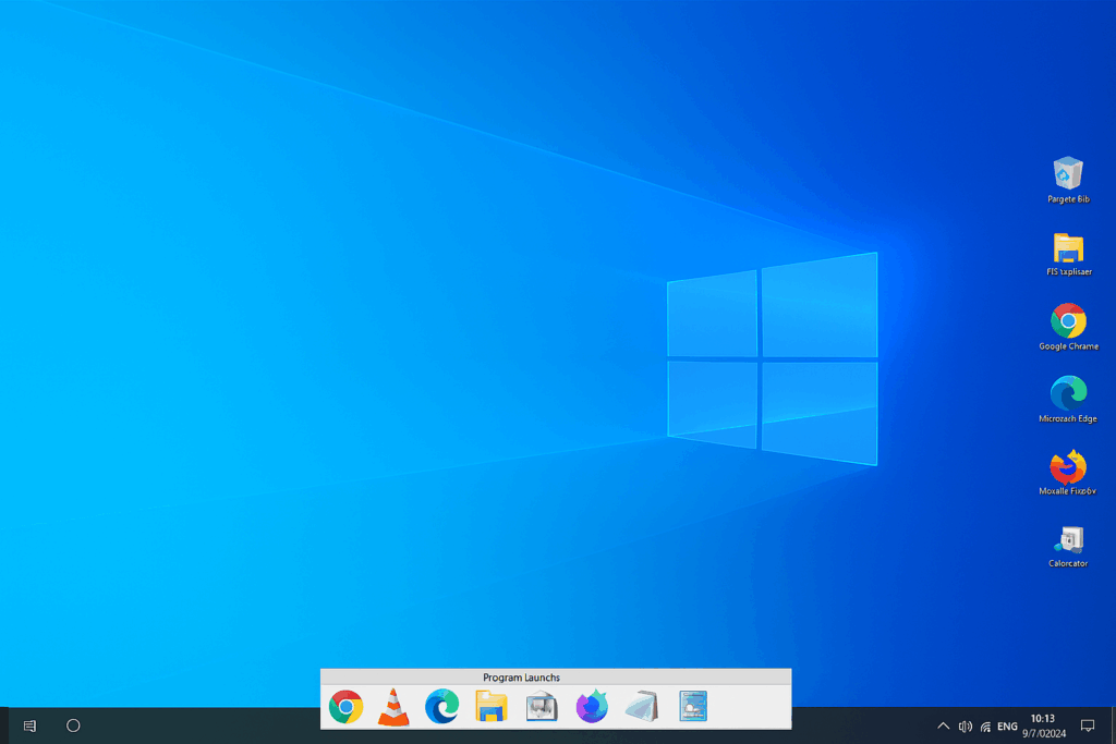 ProgramLaunch i bruk på Windows 10 – panelet er åpnet nederst på skjermen med organiserte snarveier til programmer, mens skrivebordet holdes ryddig.