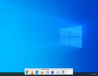 ProgramLaunch i brug på Windows 10 – panelet er åbnet nederst på skærmen med organiserede genveje til programmer, mens skrivebordet holdes ryddeligt.