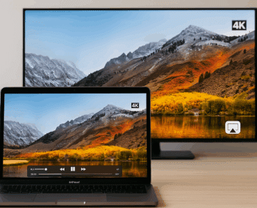 MacBook og TV viser samme 4K-video via AirPlay med bjerglandskab og efterårsfarver, som illustrerer trådløs streaming med 5KPlayer på Mac.