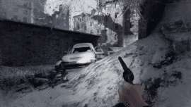 Metro 2033 Redux gameplay med pistol i hånden foran sneklædte ruiner på Moskvas ødelagte overflade.