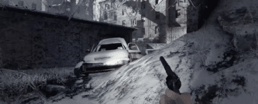 Metro 2033 Redux gameplay med pistol i hånden foran sneklædte ruiner på Moskvas ødelagte overflade.