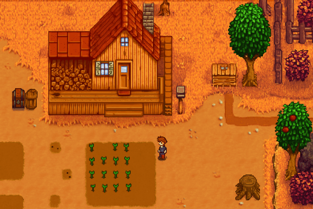 Skærmbillede fra Stardew Valley med en bonde foran en træhytte omgivet af efterårsfarvede træer, afgrøder og værktøj.