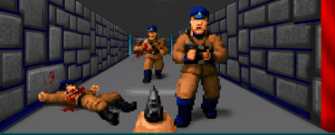 Skærmbillede fra Wolfenstein 3D, hvor hovedpersonen B.J. Blazkowicz er hårdt presset i kamp mod nazisoldater i en mørk stenbelagt korridor. Sundheden er lav, og fjender nærmer sig fra begge sider i klassisk pixelgrafik.