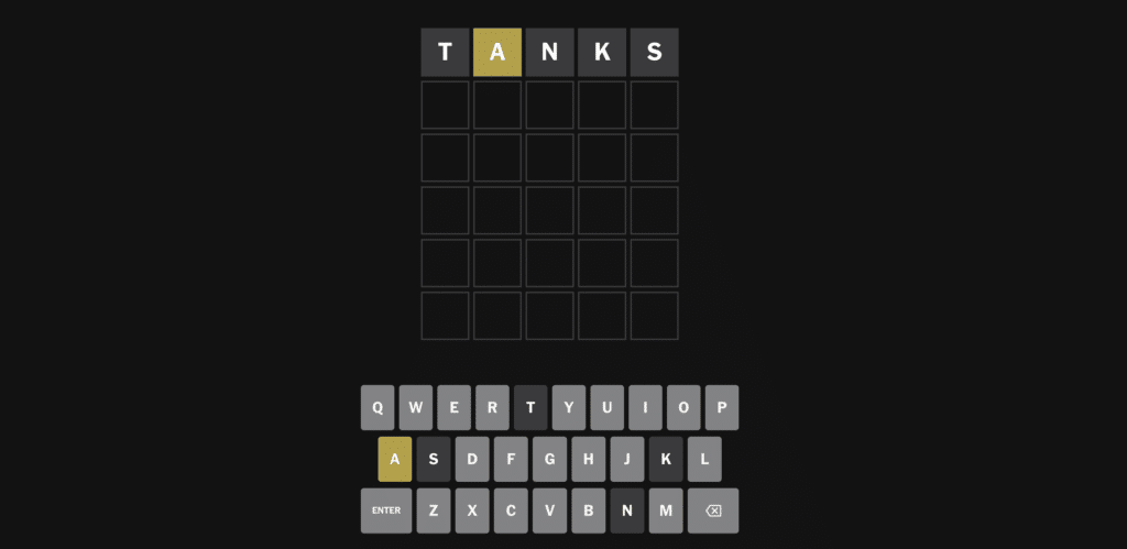 Wordle in dark mode with the starting word “TANKS,” where the letter A is yellow while the other letters are marked as incorrect.