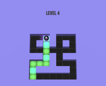 Maze Paint gameplay med en farverig kugle, der maler felter i en labyrint på level 4.