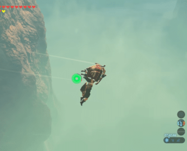 Link svæver med paraglideren gennem tågen ved en høj klippe i The Legend of Zelda: Breath of the Wild.