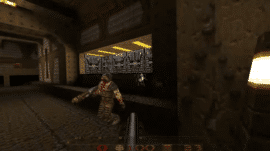 Quake gameplay med shotgun i en mørk industriel bane, hvor spilleren angriber en fjende i nærkamp.
