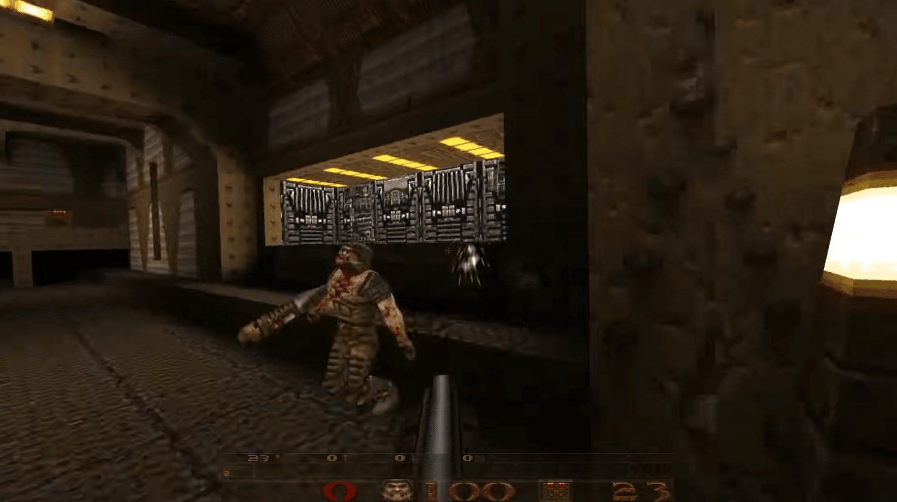 Quake gameplay with a shotgun in a dark industrial level, attacking an enemy at close range.