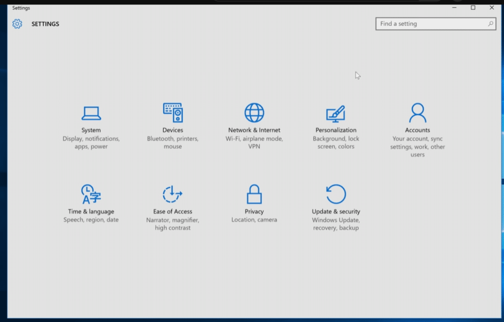Windows 10 Settings with shortcuts to System, Devices, Network & Internet, Personalization, Accounts, Privacy, and Update & Security.